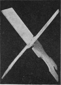 A music stand made, without joining, of two intermeshing pieces
