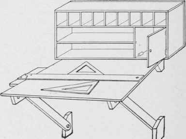 General view of the drawing board and cupboard