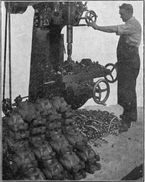 Fig. 348. Baker Driller Driving 2 1/2 Inch Drill through Drop Forged