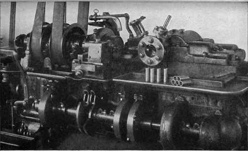 Fig. 361. Automatic at Work on Hollow Cylindrical Sleeves Courtesy of Brown and Sharpe Manufacturing Company, Providence, Rhode Island