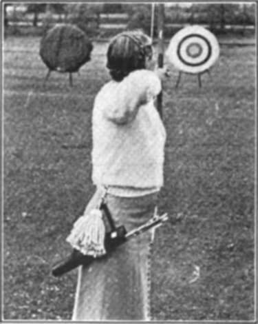 An Arrow Quiver And A Wool Tassel For Wiping Arrows Are Hooked On The Belt