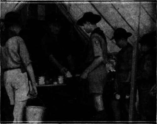The Patrol Grubmasters line up for the clay's ration