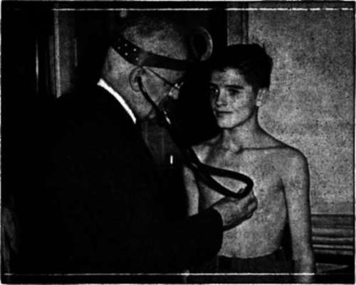 The good doctor listens with his stethoscope