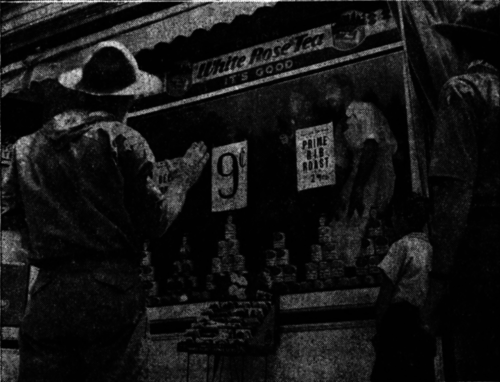 The storekeeper learns how to fashion blankets into protective blackout screens