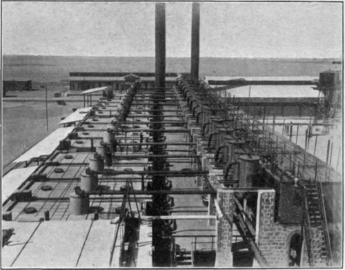 Fig. 136.   A continuous distillation bench.