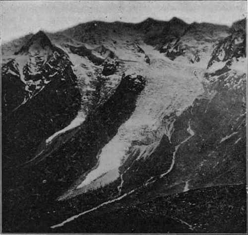 Two valley glaciers descending Mt. Blanc, showing the terminal moraine at the foot of each.