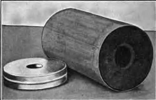 Case loaded with composition showing depression for first fire composition.