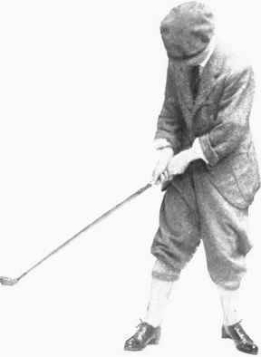 Fig. 22.   Left hand has not forced club head back.