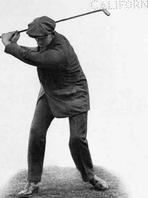 HALF SHOT WITH IRON: TOP OF SWING